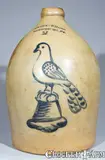 COWDEN & WILCOX / HARRISBURG, PA Stoneware Jug w/ Cobalt Bird on Stump by Cowden & Wilcox, circa 1865, Stoneware, sold Mar 2009