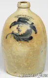 Cowden & Wilcox, COWDEN & WILCOX / HARRISBURG, PA Stoneware Jug w/ Man-in-the-Moon Wearing a Hat