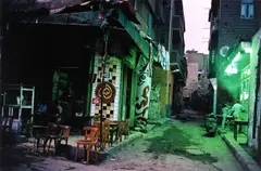 Harry Gruyaert, A street at the end of Ramadan, Cairo, Egypt 1986, 1986, Dye transfer print, printed in 1989 on double-weight semi-matte paper