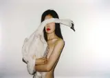 Ren Hang, Untitled, China 2010s, Chromogenic print, mounted on Alu-dibond, in excellent condition. Original white wooden frame