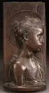 Desiderio da Settigano, The Young St. John the Baptist, Bronze relief plaque with dark brown patina
