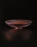 Large shallow bowl by Gertrud Natzler and Otto Natzler, circa 1960, Earthenware, copper and violet iridescent glaze with hare's fur pattern, sold Jun 2015