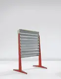 Shutters from the first floor of Air France l'Unité d'Habitation (housing unit), Brazzaville, mounted on "Portants d'Exposition" by Jean Prouvé, circa 1950, Portants: painted steel, diamond point aluminum. Shutters: painted aluminum, corrugated aluminum, offered Jun 2015