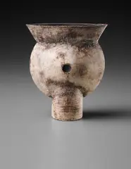 Early thistle form by Hans Coper, circa 1956, Stoneware, layered white porcelain slips and engobes over a body with textured and incised linear designs, the interior , sold Dec 2015