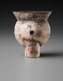 Early thistle form by Hans Coper, circa 1956, Stoneware, layered white porcelain slips and engobes over a body with textured and incised linear designs, the interior , sold Dec 2015