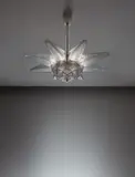 "Stockholm III” chandelier, Marcilhac no. 2286 by René Lalique, designed 1927, Molded and frosted glass, chromium-plated metal, sold Dec 2015