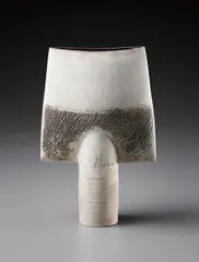 "Spade" form by Hans Coper, circa 1972, Stoneware, layered white porcelain slips and engobes over a body with textured and incised linear designs, the interior , sold Dec 2015