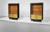Eugène Printz, Pair of bookcases, circa 1932, Ebonized wood, walnut-veneered wood, bronze, brass, glass