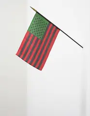 African American Flag by David Hammons, 1989, printed fabric with painted wood pole, sold Mar 2014