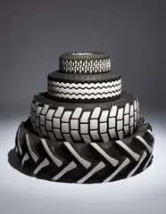 Rob Pruitt, Untitled, 2011, 4 tires, hub-cap, black and white M&M's