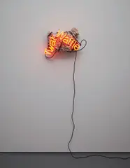 Jason Rhoades, Twat Waffle, 2003, neon sign, foam, tape, plastic lego pieces, wood, astroturf