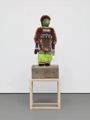 Like a Hammer (Figure) by Jeffrey Gibson (Choctaw & Cherokee), 2014, wool, wood, deer rawhide, glass beads, steel studs, copper jingles, acrylic yarn, quartz crystals, brass bells, Angora g, sold Sep 2014