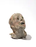 Kiki Smith, Untitled (Head with Glass Eyes and Tin Teeth), 1994, painted phosphorous bronze with glass and tin