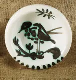 Oiseau au soleil (Bird Under the Sun) by Pablo Picasso, 1952, White earthenware turned round ash-tray painted in white and black,, sold Oct 2014