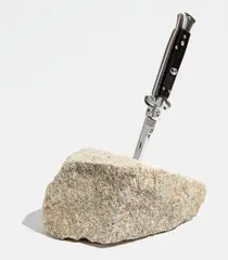 Mark Bradford, The Once and Future King, 2011, Knife with metal blade in stone,