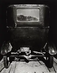 Wright Morris, Model T in Shed, The Home Place, near Norfolk, Nebraska (Uncle Ed's Car), 1947, Gelatin silver print, printed later