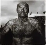 Diane Arbus, Tattooed man at a Carnival, M.D., 1970, Gelatin silver print, printed later by Neil Selkirk