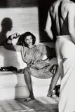 Woman Examining Man, U.S. Vogue, Saint-Tropez by Helmut Newton, 1975, Gelatin silver print from Helmut Newton Photographien , printed 1998, sold Apr 2014