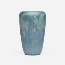 Transitional scenic vase with tall pines and Spanish moss by Henrietta Bailey for Newcomb College Pottery, 1914, glazed earthenware, sold May 2026