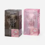 Kaws, Indonesia Holiday Figures (two works, Pink and Black), 2023, painted cast vinyl