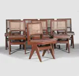 Set of eight 'PJ-01-01-11' chairs by Pierre Jeanneret, c.1959, each of teak with braided canework, sold Jul 2025