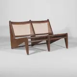 'PJ010704' two-seater lounge sofa by Pierre Jeanneret, teak and cane with upholstered cushions, sold Jul 2025