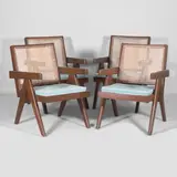Set of four teak and cane 'Easy' armchairs by Pierre Jeanneret, c.1955, sold Jul 2025