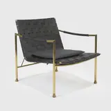 Jonathan Adler, 'Thebes' lounge chair, the woven leather seat supported on a polished brass frame