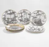 Seven plates by Piero Fornasetti, sold Jul 2025