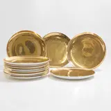 Set of twelve plates by Piero Fornasetti, sold Jul 2025