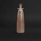 René Lalique, 'Ambre Antique' scent bottle, 1910, frosted and sepia stained glass