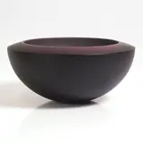 Rachael Woodman, Studio glass bowl, 1986, deeply cased in amethyst glass with an acid-etched interior