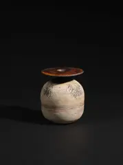 Hans Coper, Ovoid pot with disc, circa 1965