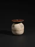 Hans Coper, Ovoid pot with disc