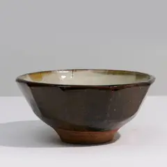 Bol by Bernard Leach, A monogrammed bowl in partially glazed stoneware by Bernard Leach with Leach Pottery's seal circa 1960, sold Nov 2024