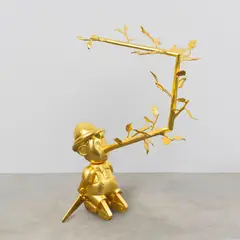 Liseuse Pinocchio Tricheur by Hubert Le Gall, Bronze doré, sold Nov 2024