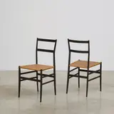 Gio Ponti, Paire de chaises Superleggera, n. 699, A pair of 'Superleggera' chairs in lacquered ash and cane by Gio Ponti designed in 1957 and edited by Cassina