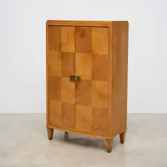 Jacques Adnet, Cabinet, A cabinet in oak, okoume and patinated brass by Jacques Adnet circa 1940