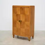 Jacques Adnet, Cabinet, A cabinet in oak, okoume and patinated brass by Jacques Adnet circa 1940