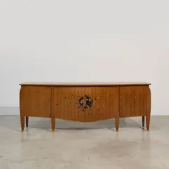Important buffet by Jules Leleu, Palissandre de Madagascar, sipo, incrustations d'ébène du Gabon et de nacre, bronze doré, offered Nov 2024