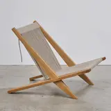 Chauffeuse PP 106 by Poul Kjaerholm & Jørgen Høj, sold Nov 2024