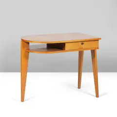 Bureau by Jacques Adnet, A desk in varnished oak and brass by Jacques Adnet designed circa 1960, sold Sep 2024