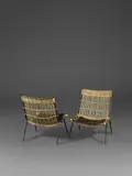 Raoul Guys, Paire de chauffeuses, A pair of low chairs in painted metal and rattan by Raoul Guys and edited by Airborne circa 1950