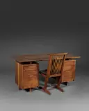 Ensemble comprenant un bureau Double Pedestal et une chaise Conoid by George Nakashima, A set comprising a 'Double pedestal' desk and a 'Conoid' chair in American walnut by George Nakashima respectively in 19, sold May 2024
