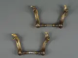Deux paires de poignées by Elizabeth Garouste and Mattia Bonetti, Bronze patiné et métal, sold May 2024