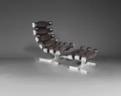 Pierre Vandel, Fauteuil Vertèbre et son ottoman, A 'Vertèbre' armchair and its ottoman in stainless steel and leather by Pierre Vandel designed in 1972 and edited by Pierre Vandel