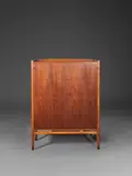Cabinet Bangkok by Yngve Ekstrom, A 'Bangkok' cabinet in teak, beech and brass by Yngve Ekström designed in 1952 and edited by Westbergs Möbler, offered May 2024