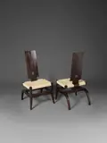 Victor Courtray, Paire de chaises basses, A pair of low chairs in stained oak and straw by Victor Courtray circa 1945