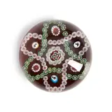 Baccarat Patterned Millefiori Glass Paperweight, France, several silhouette canes, ht. 2, dia. 2 3/4 in.