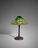 Daffodil Table Lamp by Tiffany Studios, leaded glass, patinated bronze, base stamped 'TIFFANY STUDIOS NEW YORK 531', shade stamped 'TIFFANY STUDIOS NEW YORK', sold Dec 2024